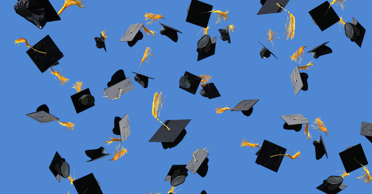 graduation caps in air stock picture from google